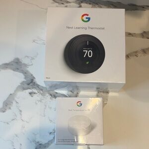 google Nest Learning Thermostat with Black Dial and White Sensor